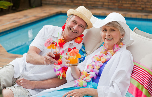 Older man and woman at poolside