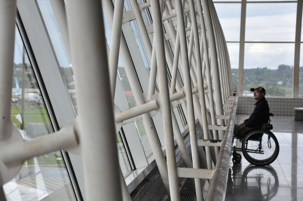 Man in wheelchair at airport