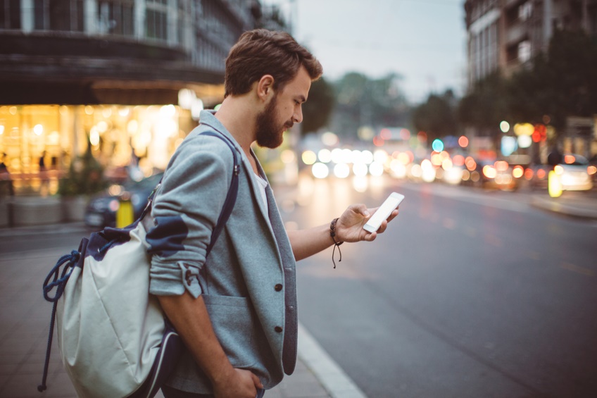 Young man on the streets of big city.